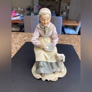 Lipper and Mann grandma with goat figurine used as shown